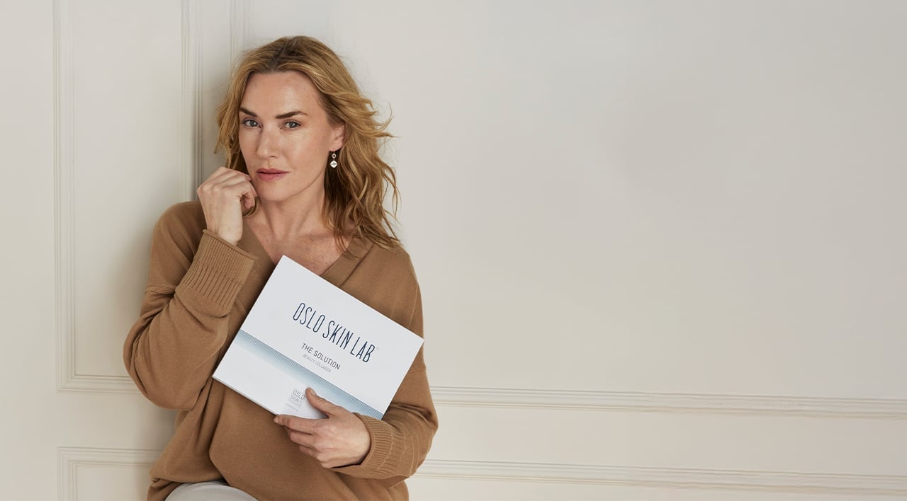 Kate Winslet abrazando The Solution