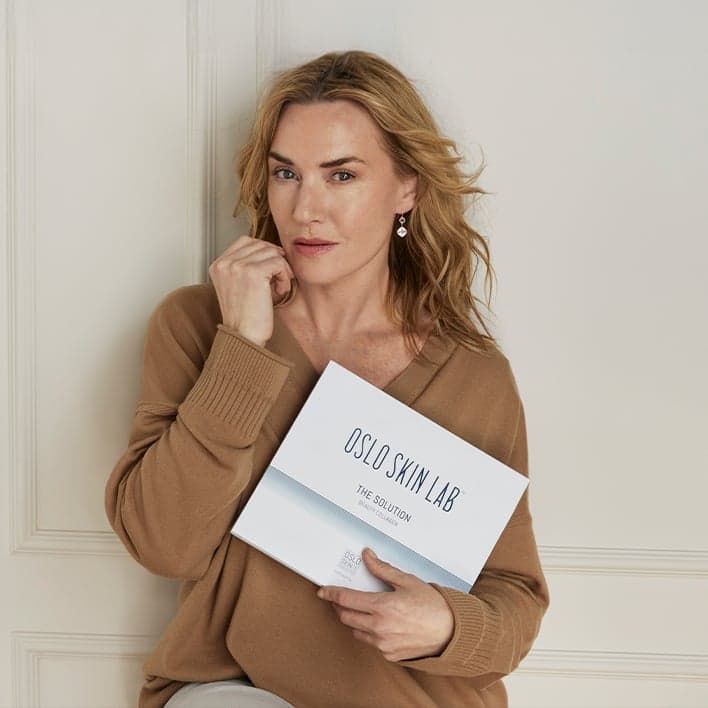 Kate Winslet abrazando The Solution
